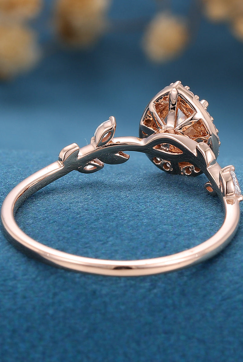 1-0-ct-pear-shaped-moissanite-halo-engagement-ring-5