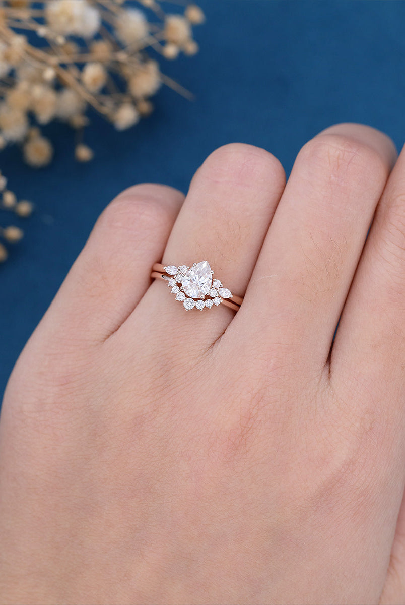 1-0-ct-pear-shaped-moissanite-cluster-bridal-set-5