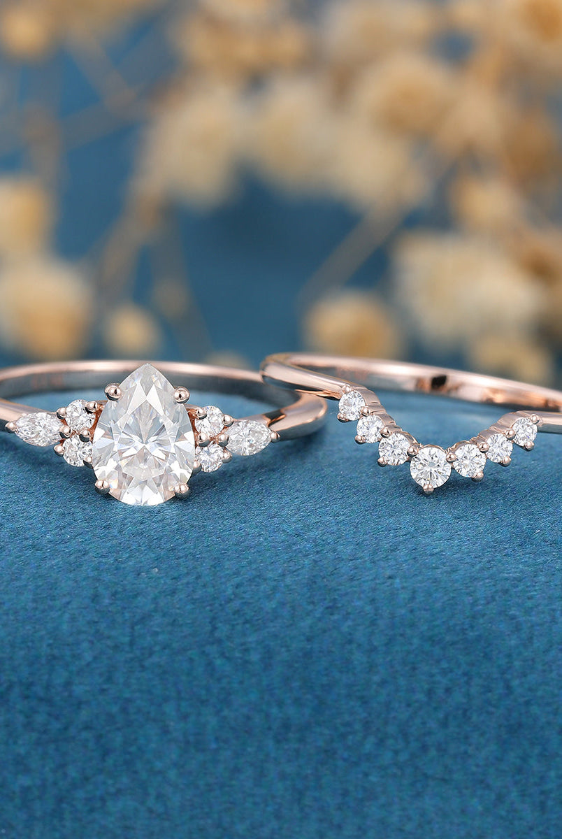 1-0-ct-pear-shaped-moissanite-cluster-bridal-set-5