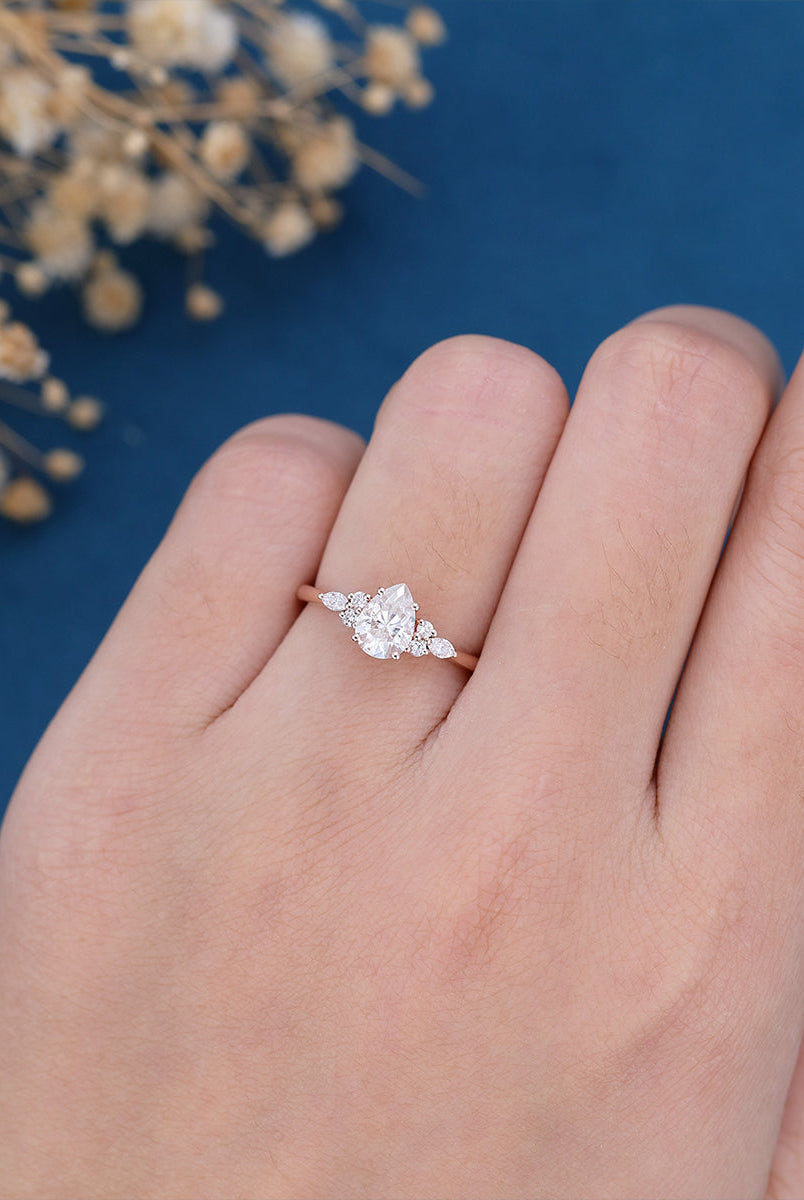 pear-shaped-moissanite-cluster-engagement-ring-18