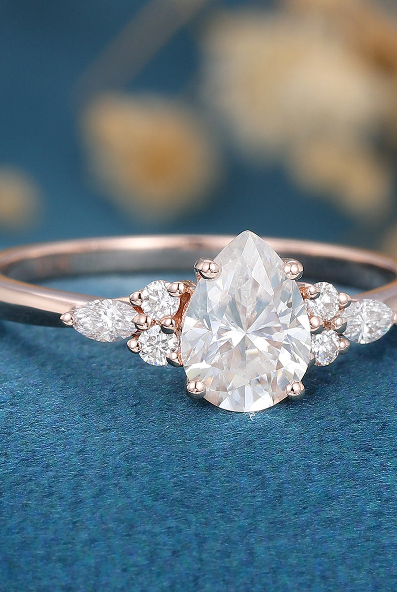 pear-shaped-moissanite-cluster-engagement-ring-18