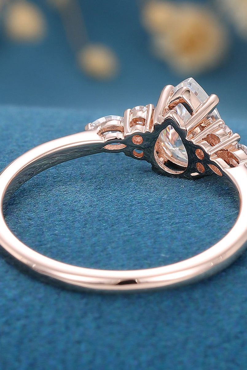 1-0-ct-pear-shaped-moissanite-cluster-engagement-ring-21