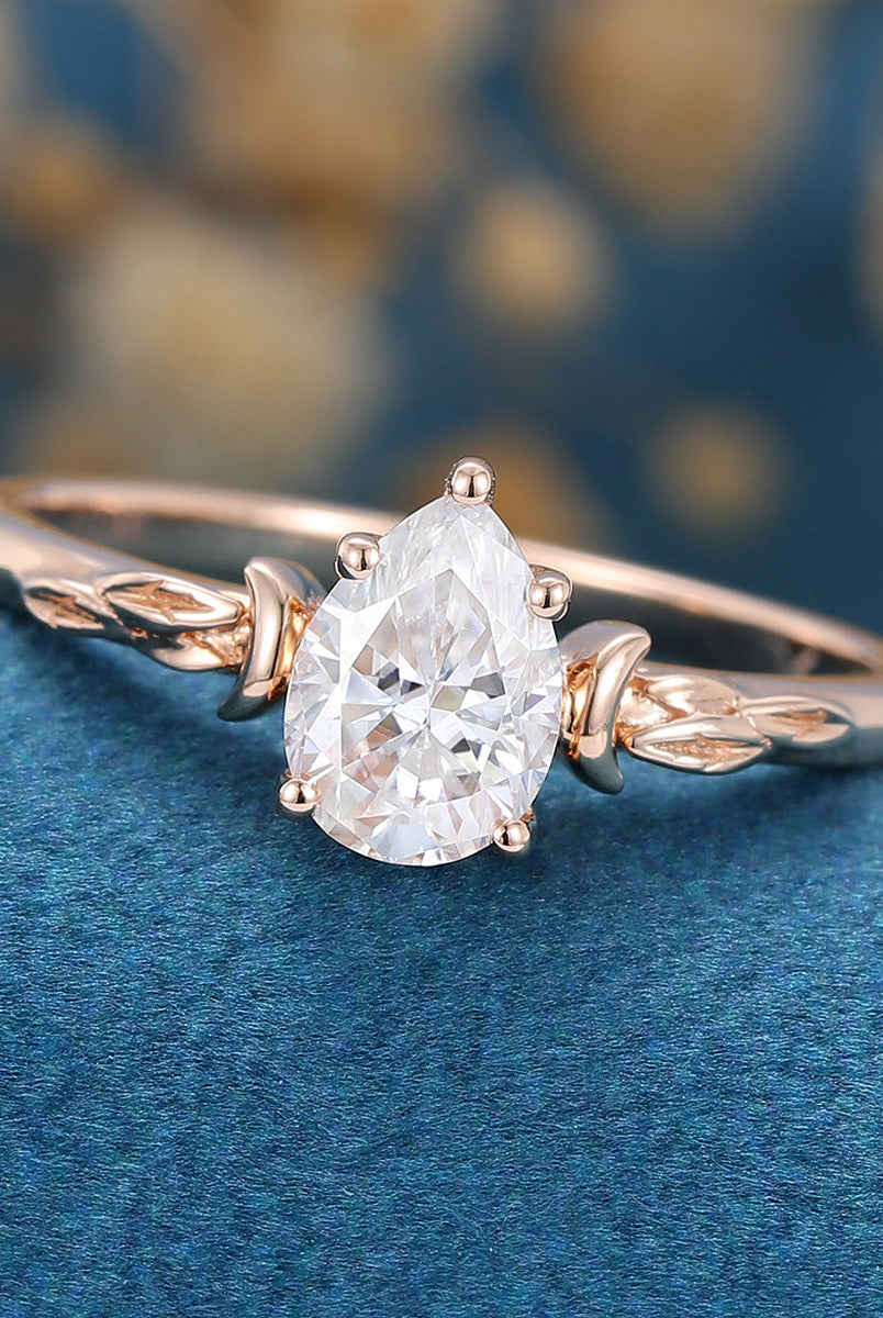 0-69-ct-pear-shaped-moissanite-vintage-solitaire-engagement-ring-5