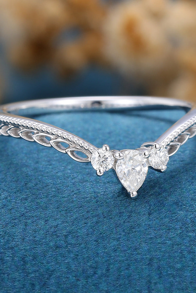 1-50-ct-round-pear-shaped-moissanite-vintage-curved-wedding-band