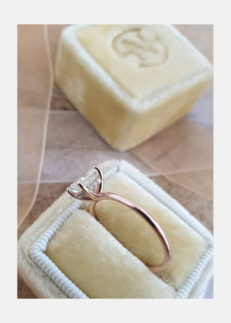 bezel set emerald cut moissanite ring