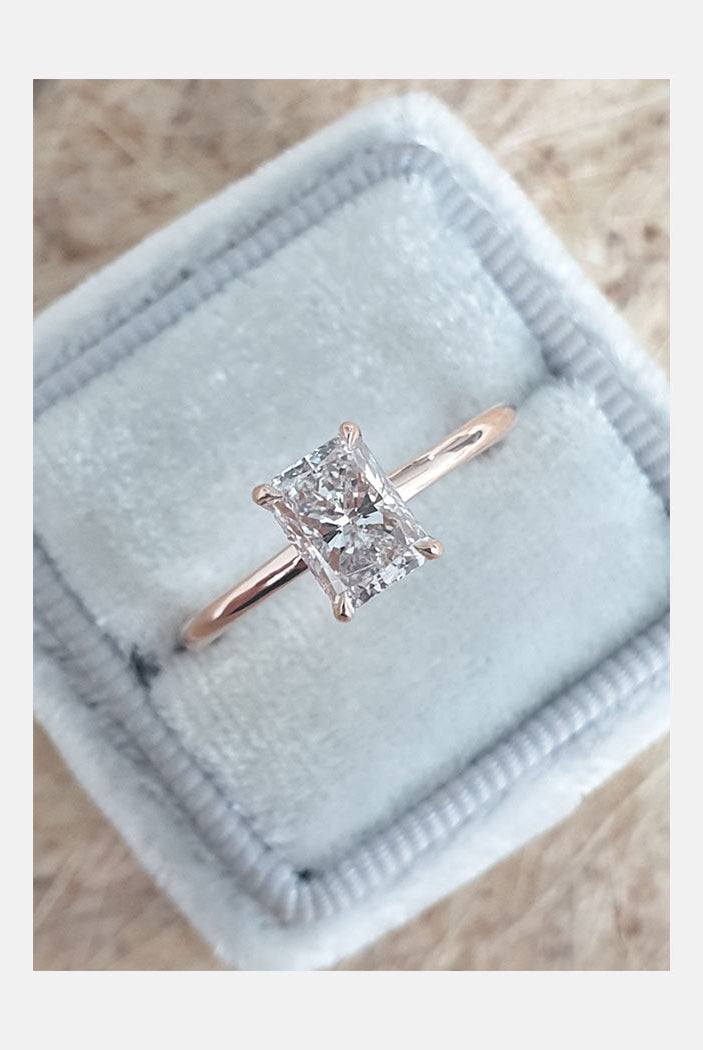 rose gold oval moissanite engagement rings