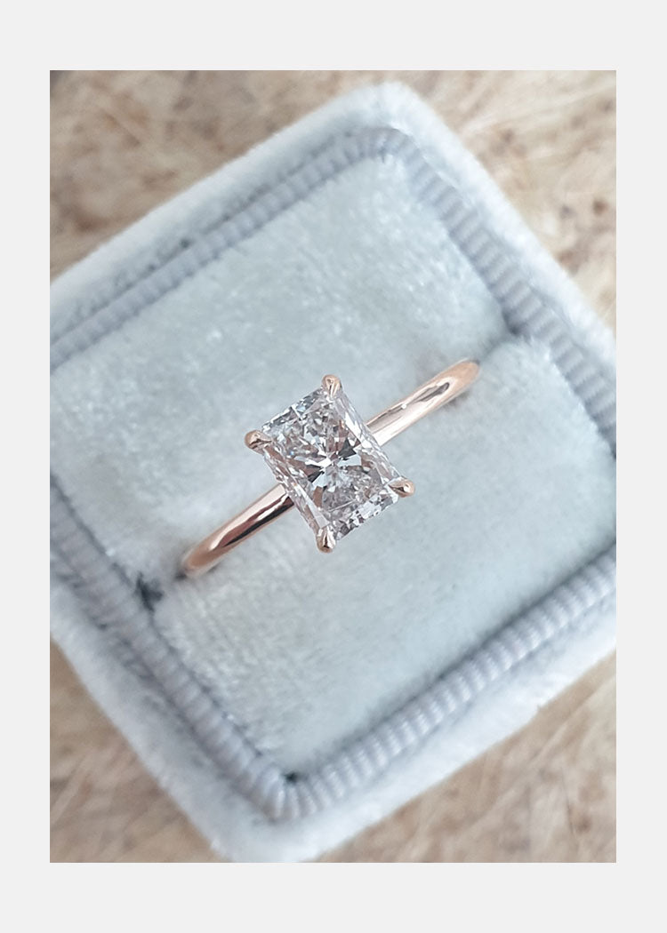 rose gold oval moissanite engagement rings