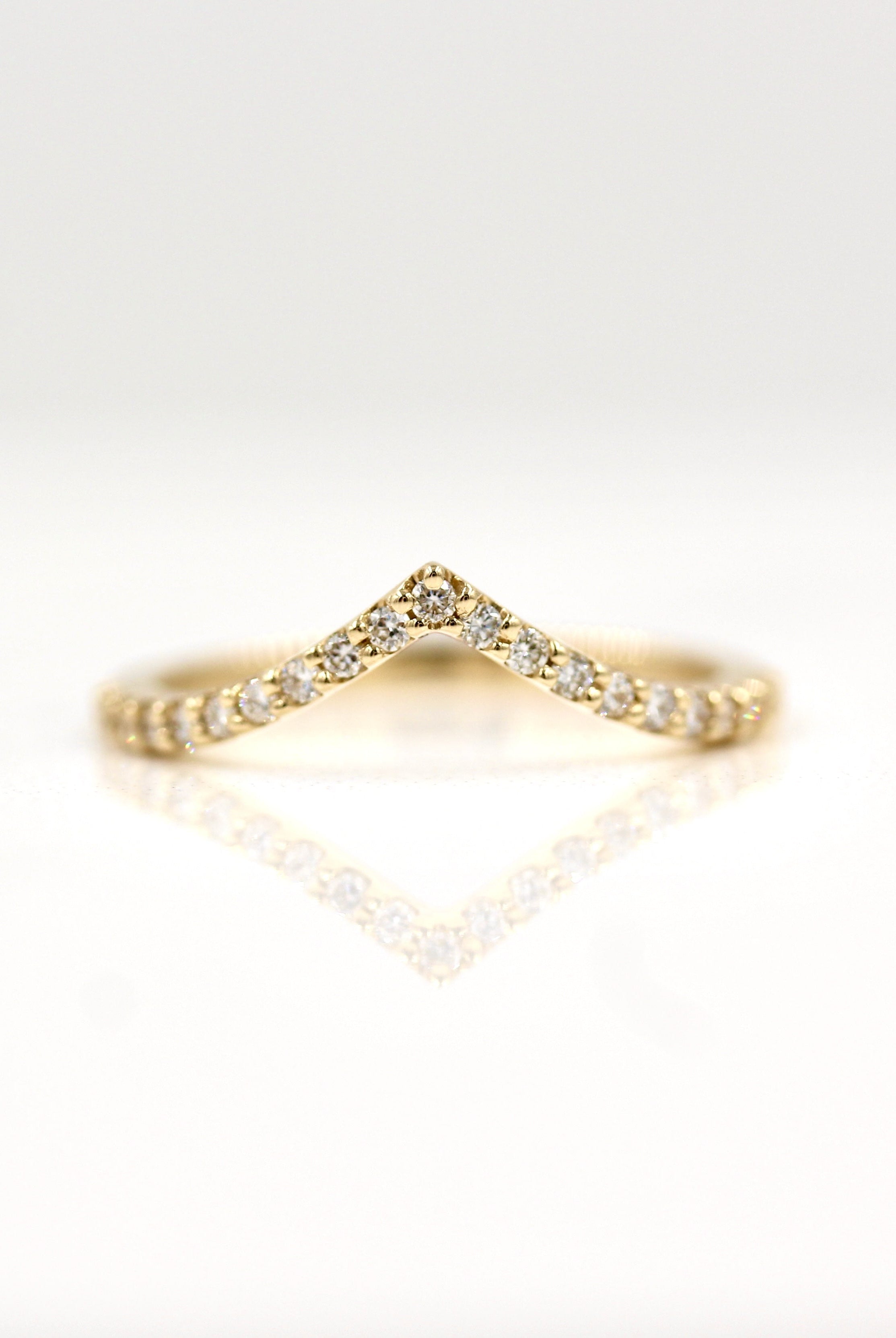 0-17-tcw-round-cut-curved-moissanite-wedding-band