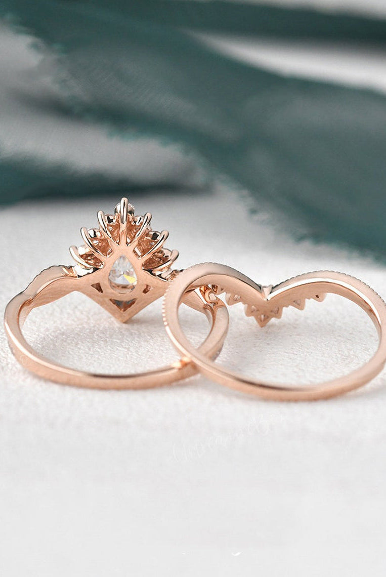pear-cut-cluster-twisted-moissanite-bridal-ring-set