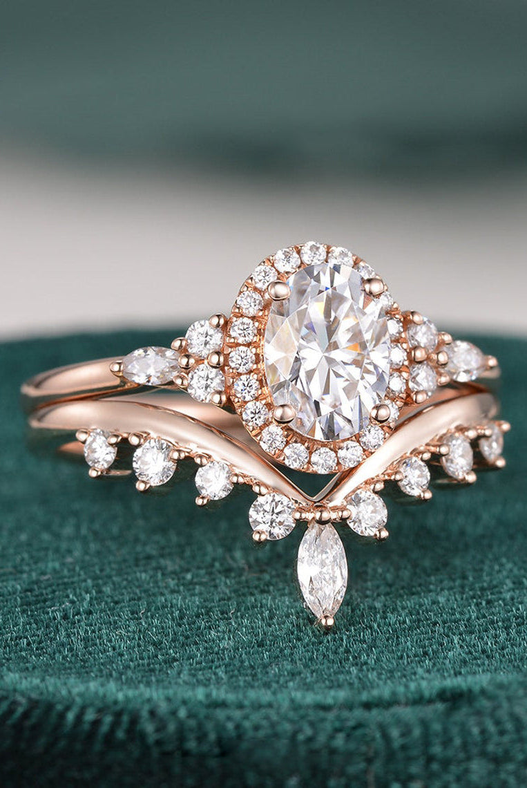 oval-cut-cluster-halo-moissanite-bridal-ring-set-1