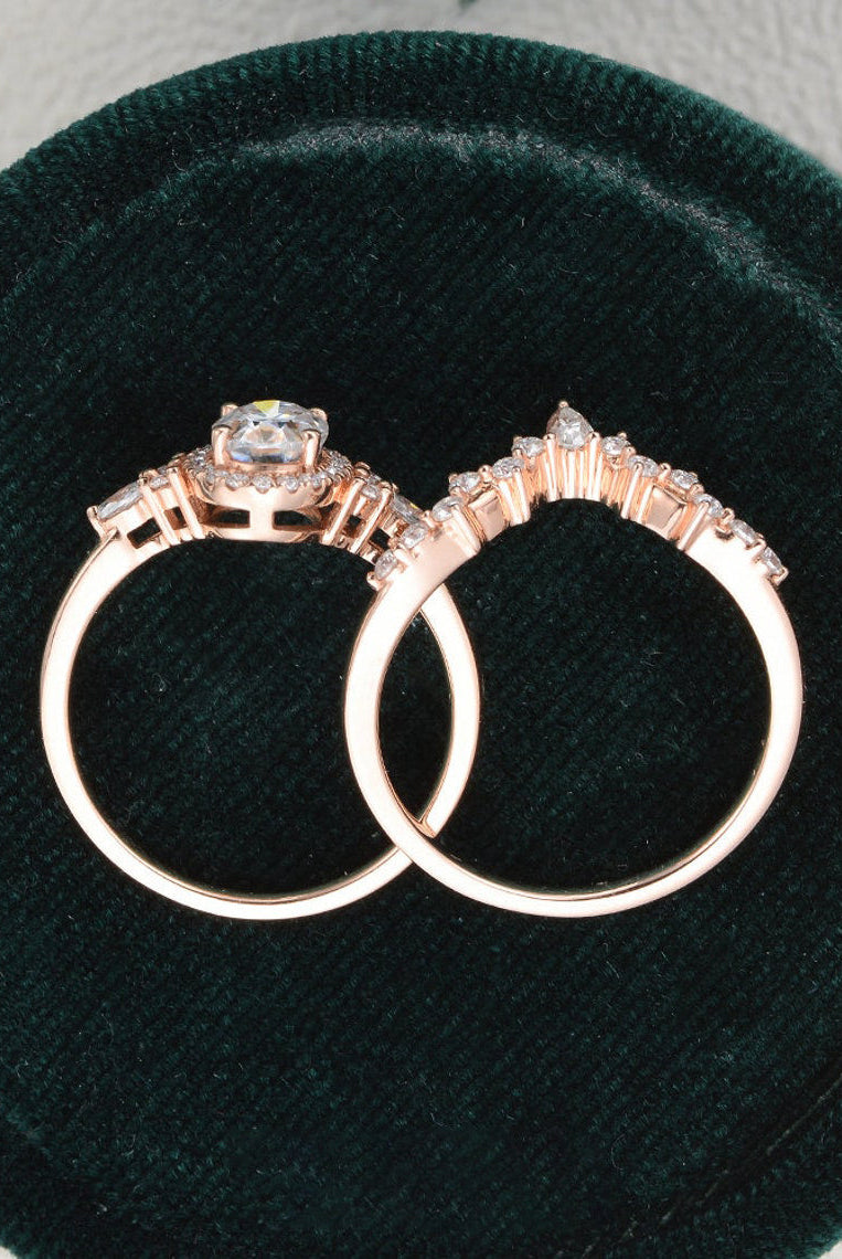 oval-cut-cluster-halo-moissanite-bridal-ring-set