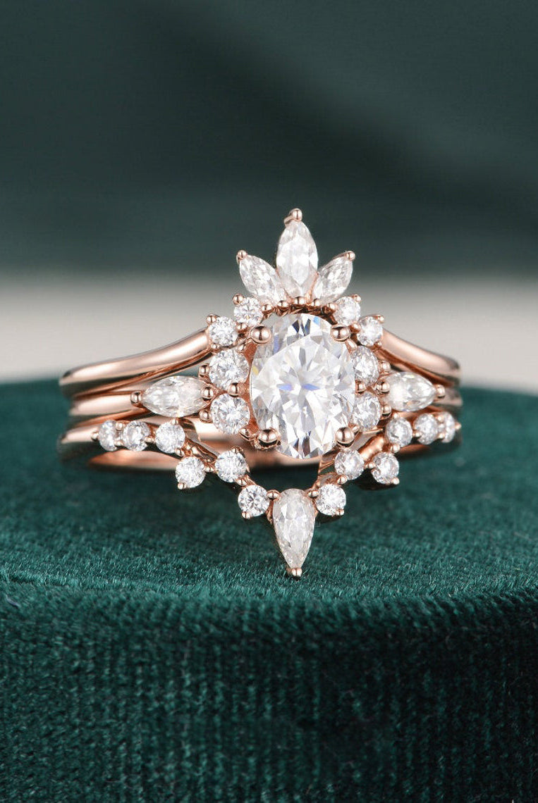 oval-cut-cluster-halo-moissanite-bridal-ring-set-1