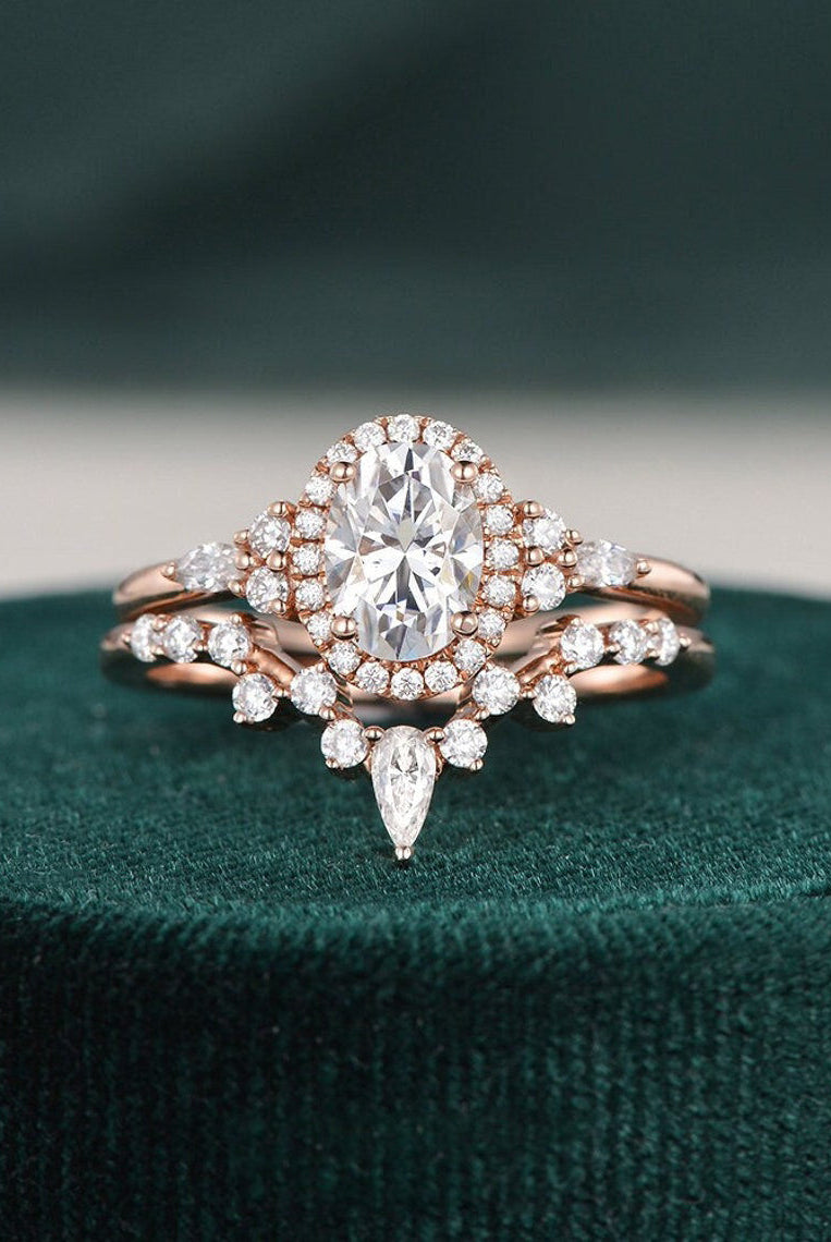 oval-cut-cluster-halo-moissanite-bridal-ring-set