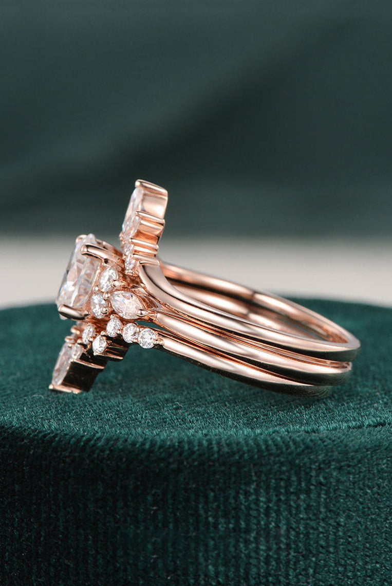 oval-cut-cluster-halo-moissanite-bridal-ring-set-1