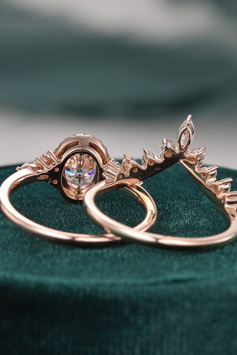 oval-cut-cluster-halo-moissanite-bridal-ring-set-1