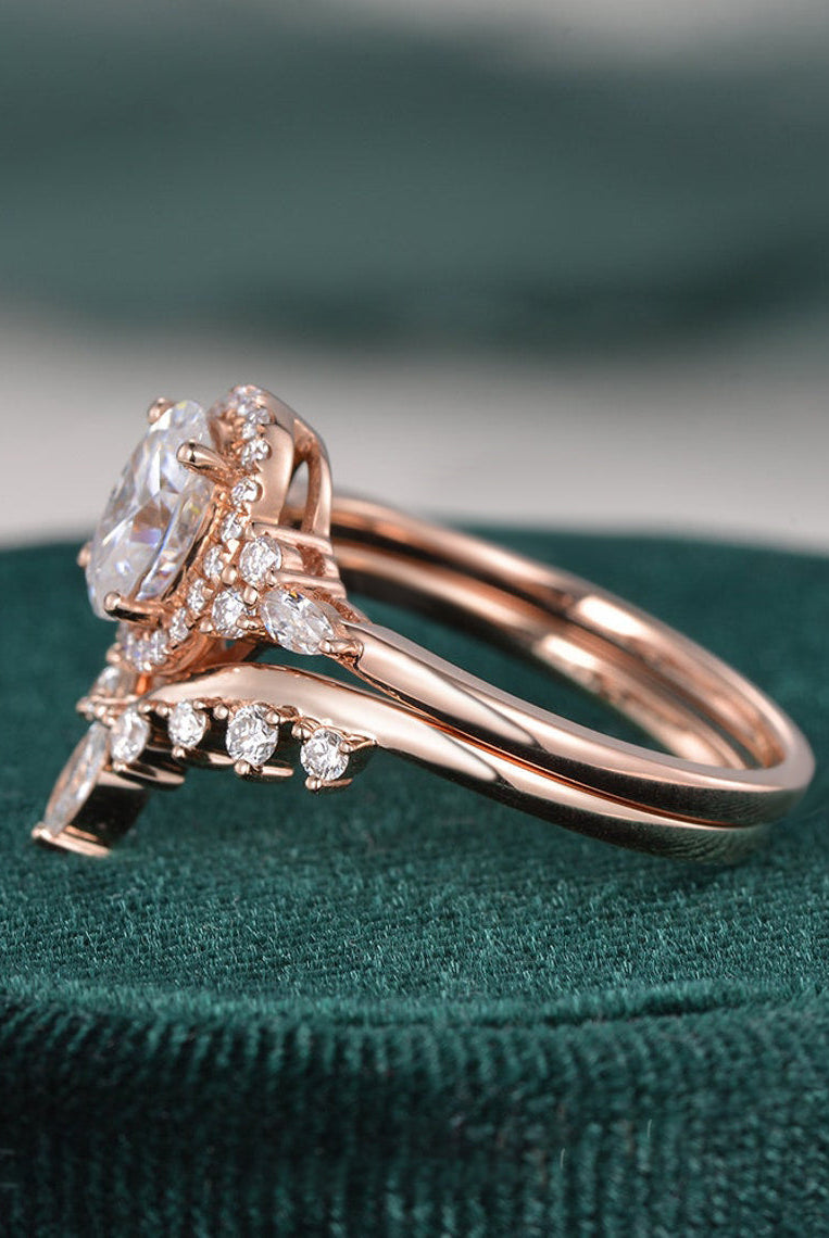 oval-cut-cluster-halo-moissanite-bridal-ring-set-1