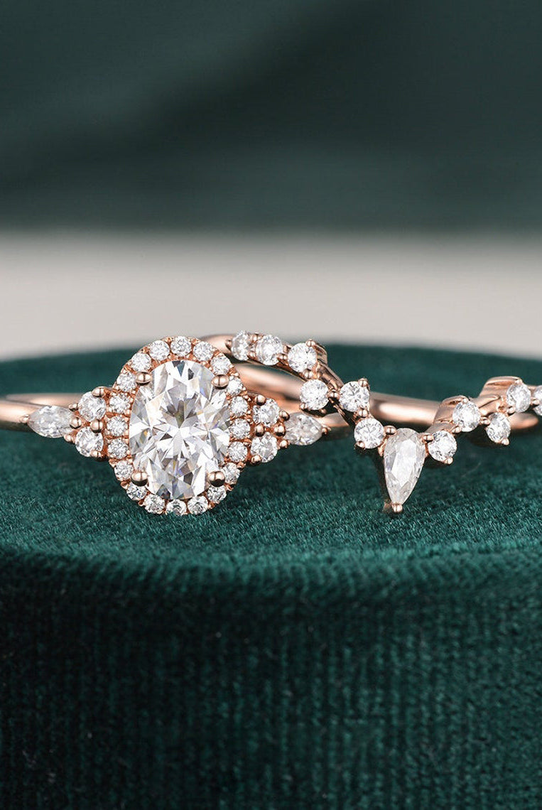 oval-cut-cluster-halo-moissanite-bridal-ring-set