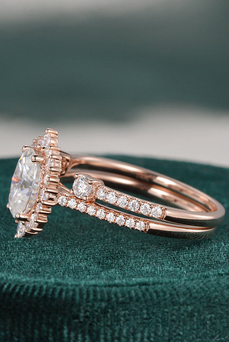 oval-cut-halo-moissanite-bridal-ring-set-1