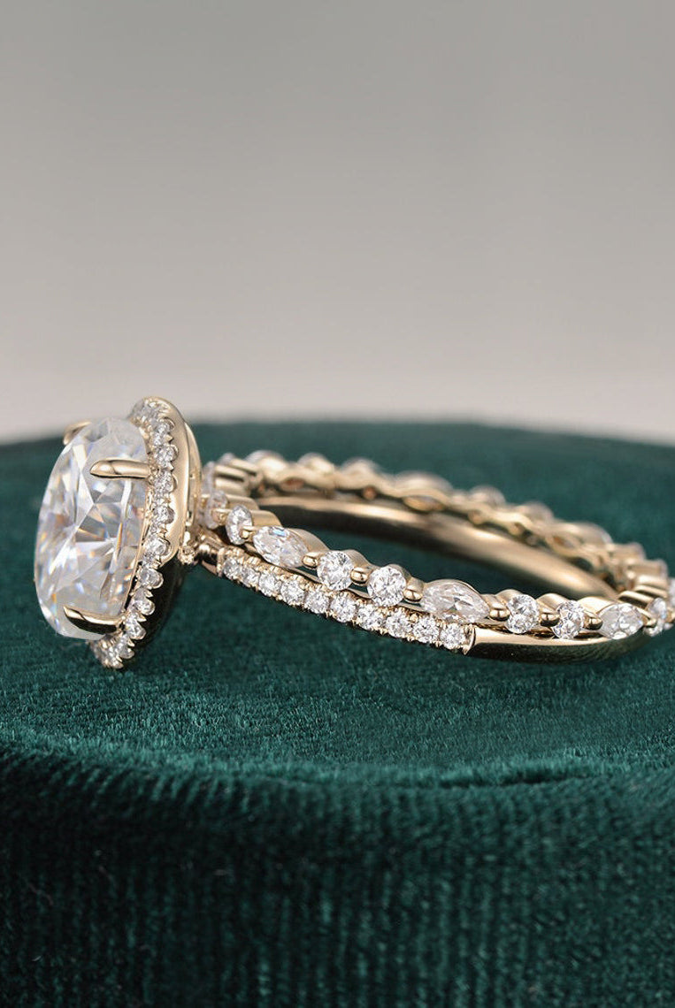 oval-cut-halo-moissanite-bridal-ring-set