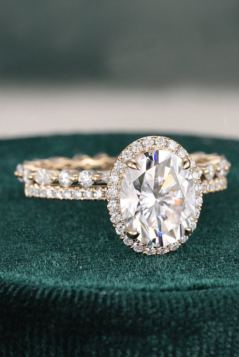oval-cut-halo-moissanite-bridal-ring-set