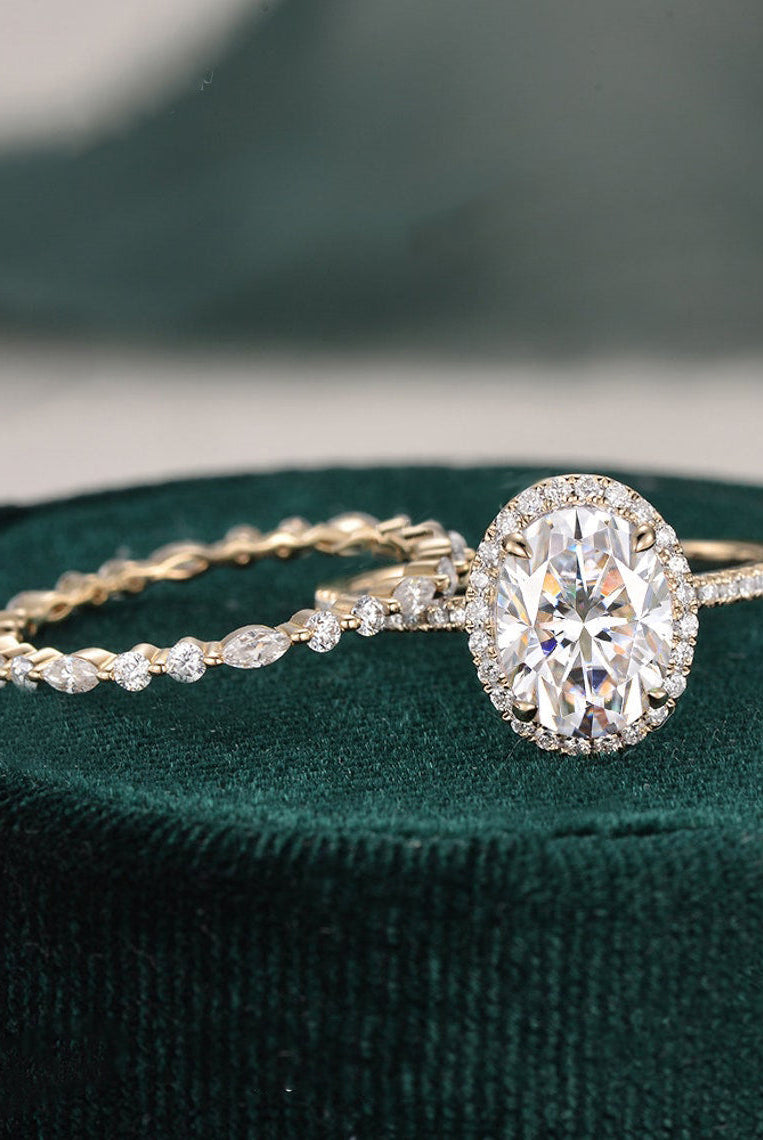 oval-cut-halo-moissanite-bridal-ring-set