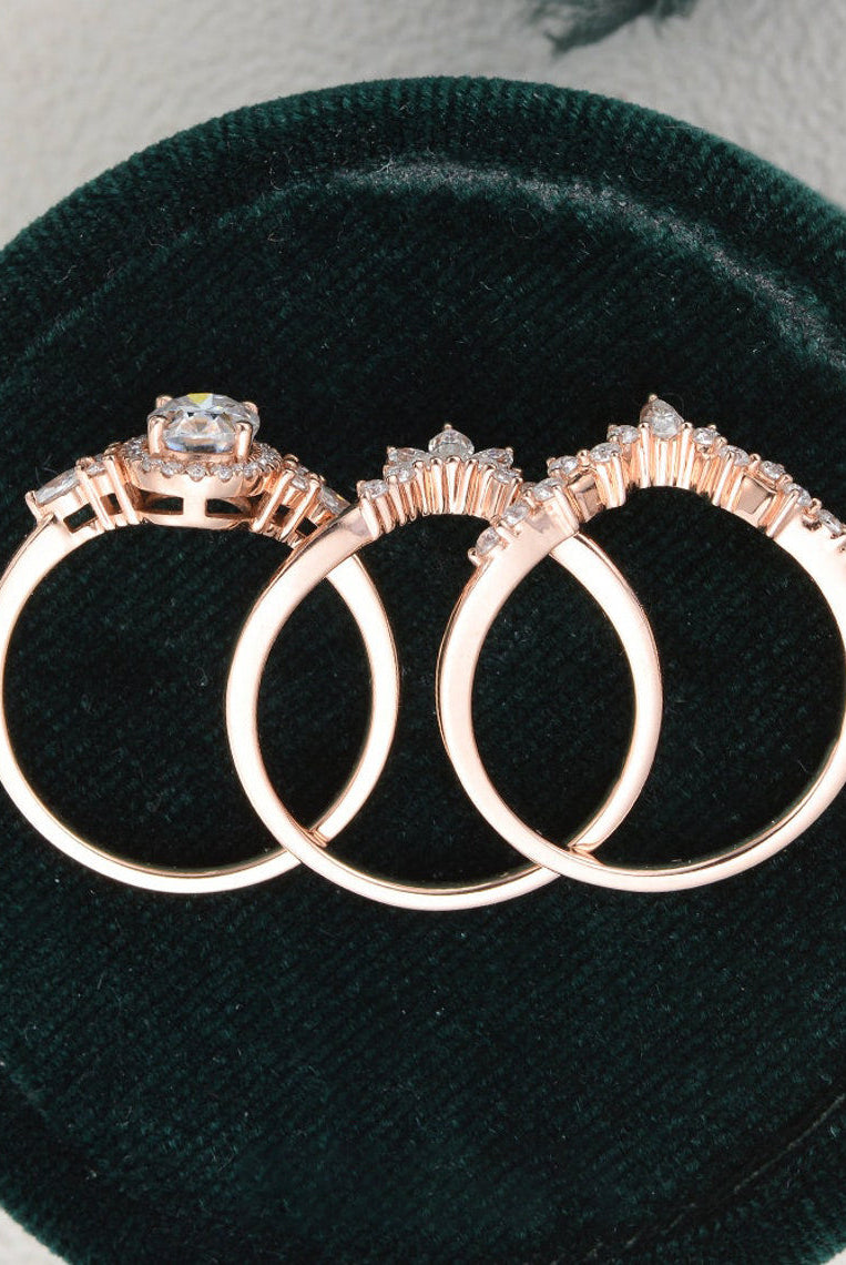 oval-cut-cluster-halo-moissanite-bridal-ring-set