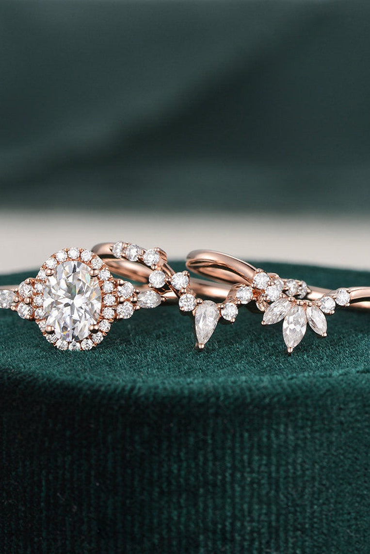 oval-cut-cluster-halo-moissanite-bridal-ring-set
