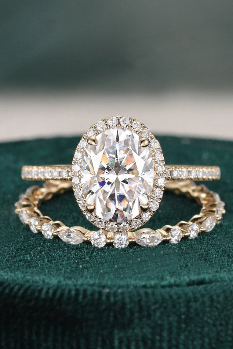 oval-cut-halo-moissanite-bridal-ring-set