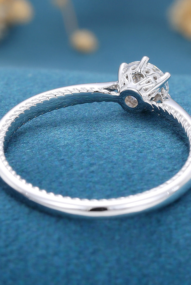 round-shaped-moissanite-solitaire-engagement-ring-3