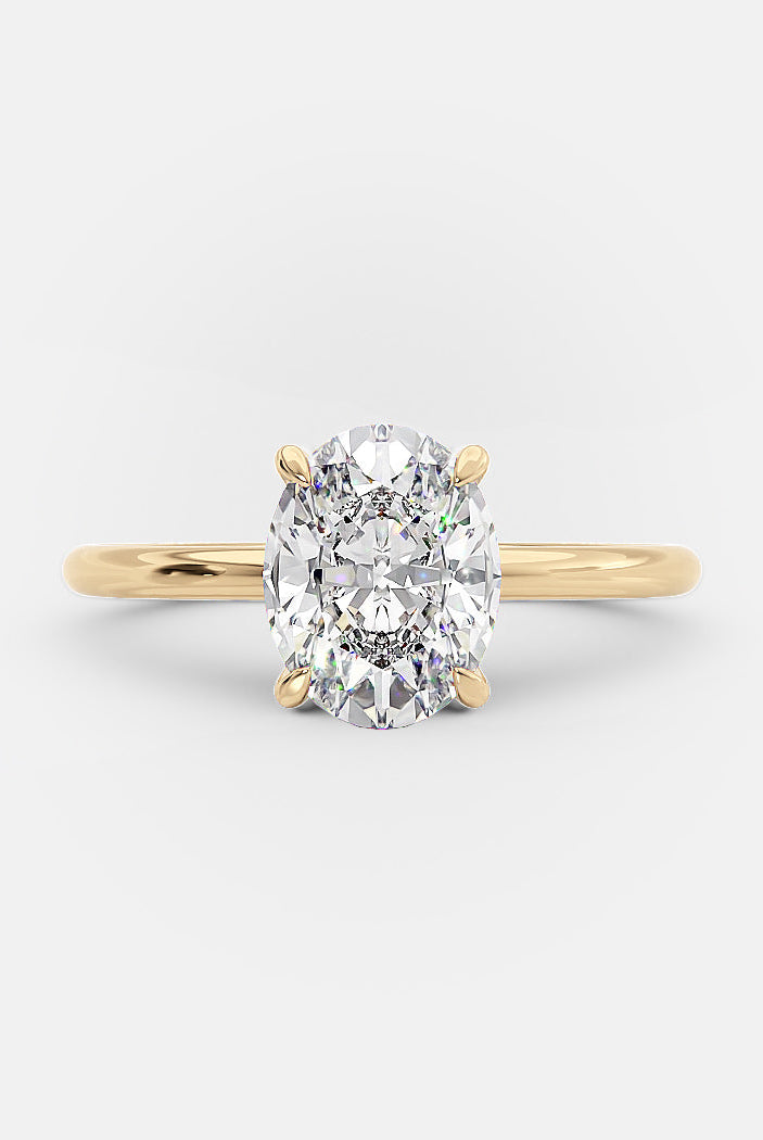 1.50ct Oval Four Prong Moissanite Diamond Solitaire Engagement Ring In 18K Yellow Gold