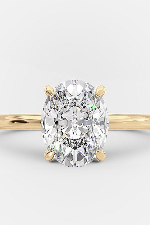 1.50ct Oval Four Prong Moissanite Diamond Solitaire Engagement Ring In 18K Yellow Gold