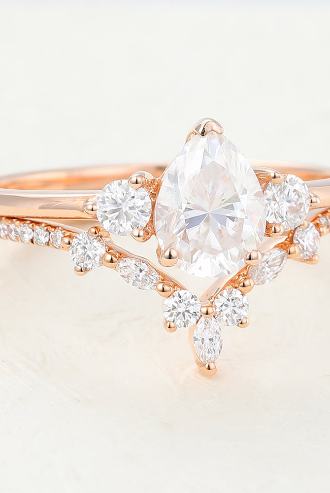 1-0-ct-pear-moissanite-three-stones-bridal-ring-set