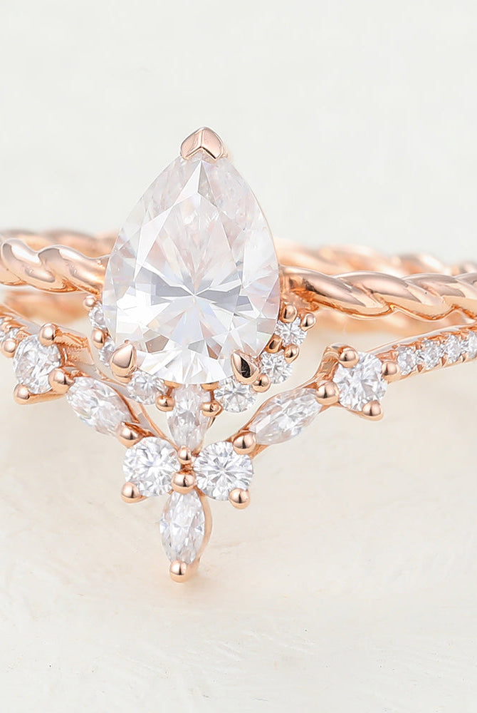 1-0-ct-pear-moissanite-cluster-bridal-ring-set-6