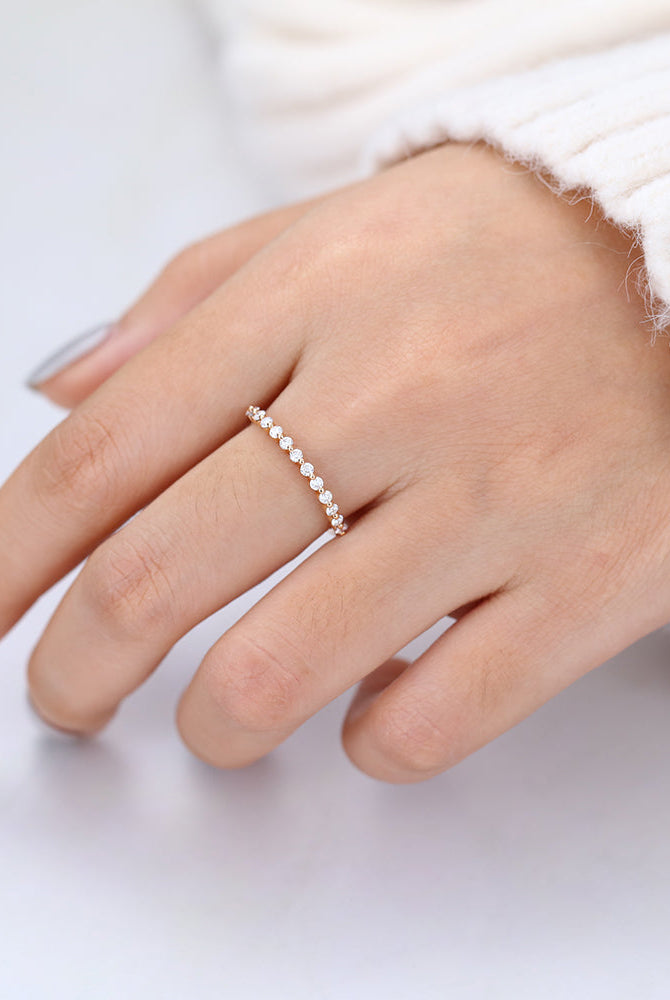 round-shaped-moissanite-minimalist-wedding-band