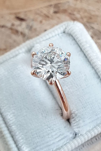 moissanite and diamond side by side