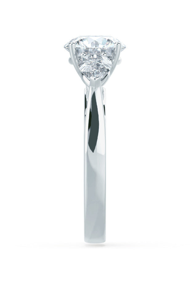 round-shaped-moissanite-three-stone-style-engagement-ring-6