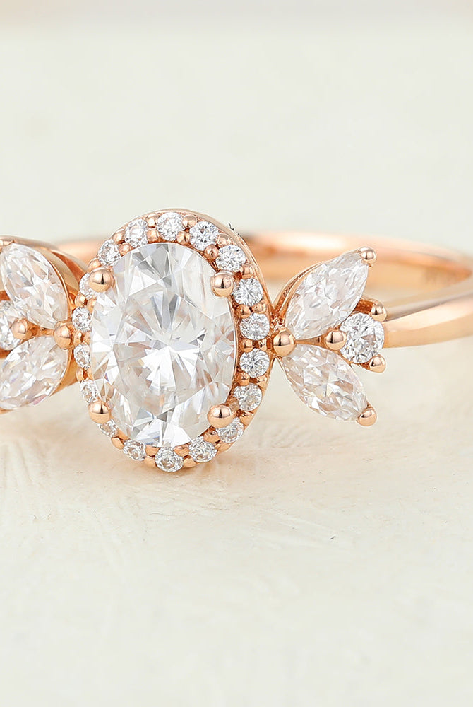 oval-shaped-moissanite-cluster-halo-engagement-ring