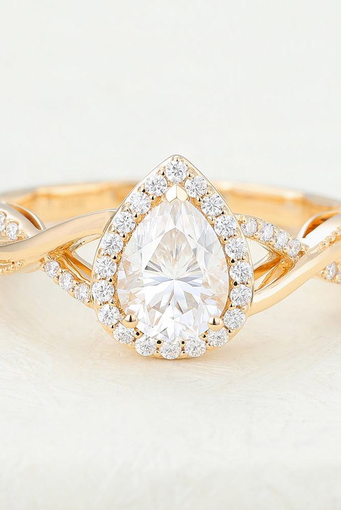 pear-shaped-moissanite-halo-twisted-pave-engagement-ring