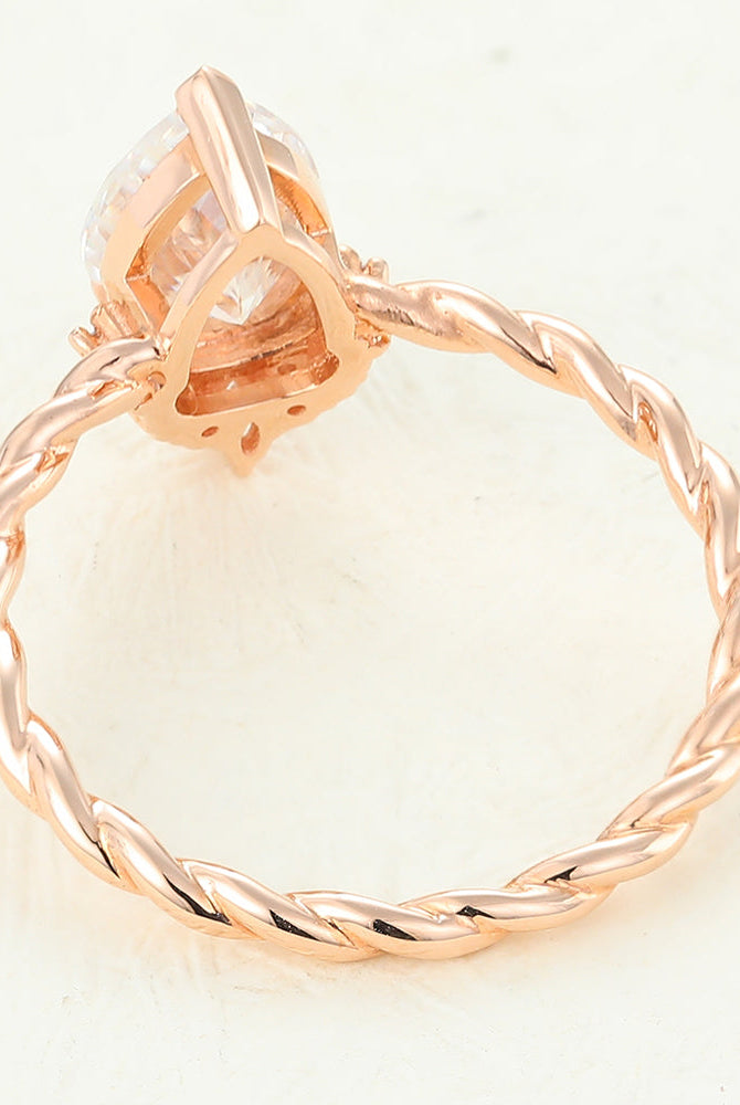 pear-shaped-moissanite-cluster-engagement-ring
