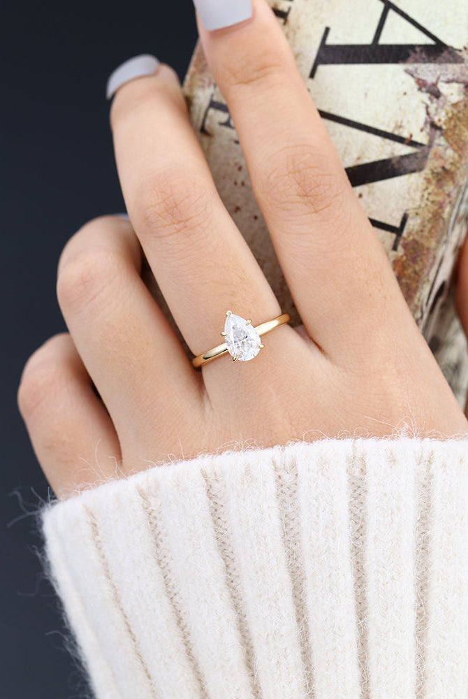 pear-shaped-moissanite-solitaire-engagement-ring