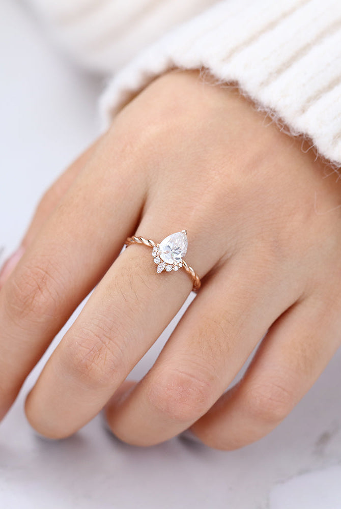pear-shaped-moissanite-cluster-engagement-ring