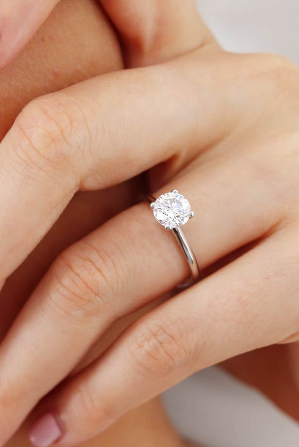 round-shaped-moissanite-solitaire-style-engagement-ring-12