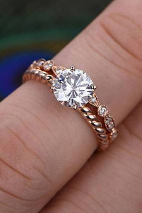 0-75-ct-round-solitaire-twisted-pave-moissanite-bridal-ring-set