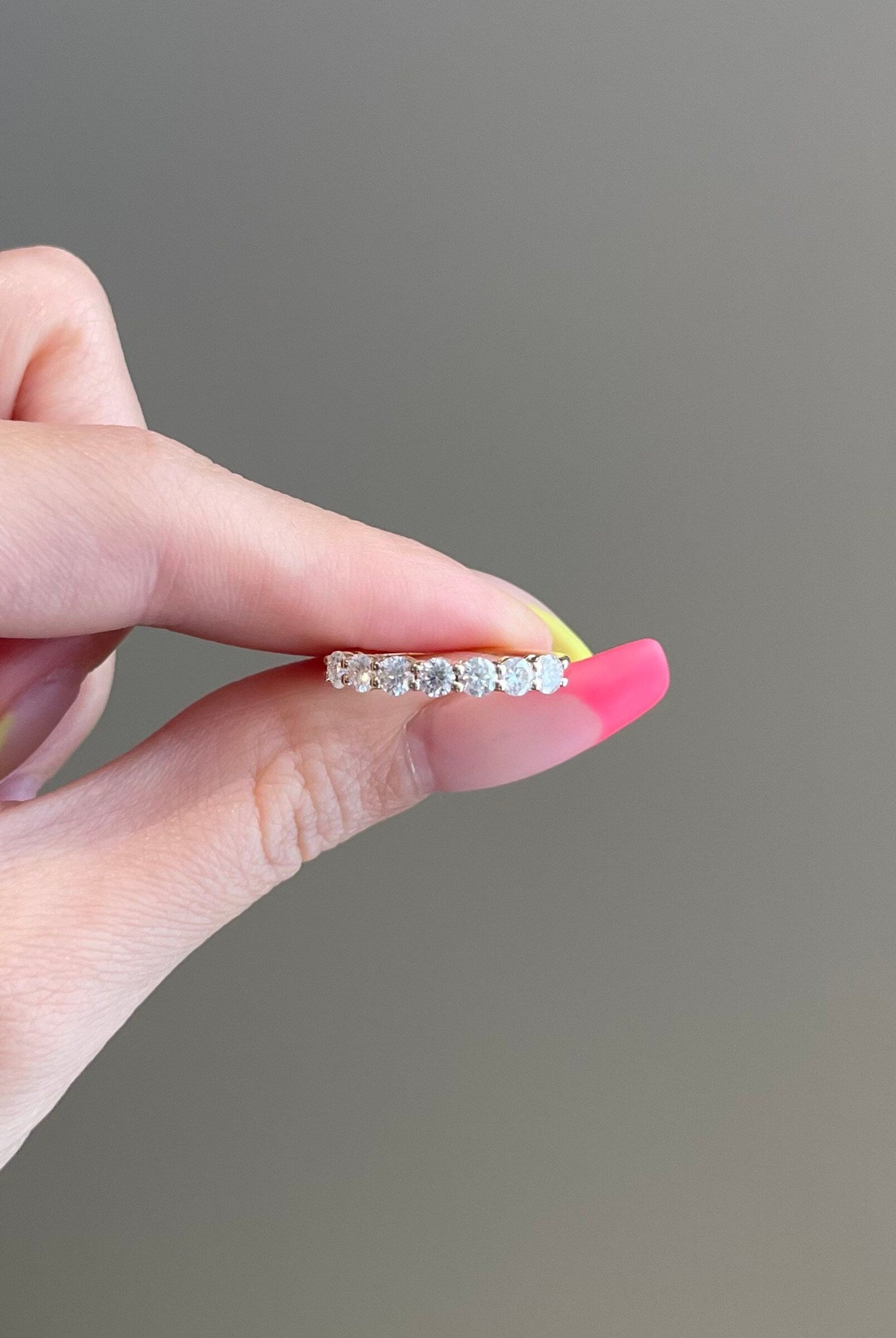 0-70-tcw-round-shaped-moissanite-seven-stones-wedding-band
