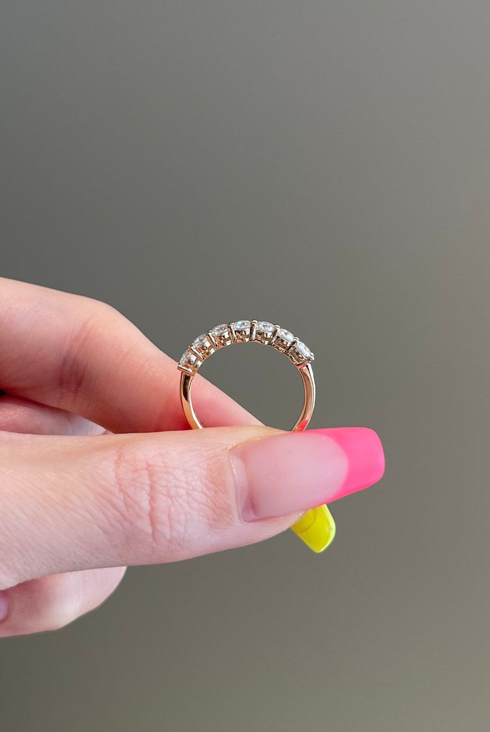 0-70-tcw-round-shaped-moissanite-seven-stones-wedding-band-1
