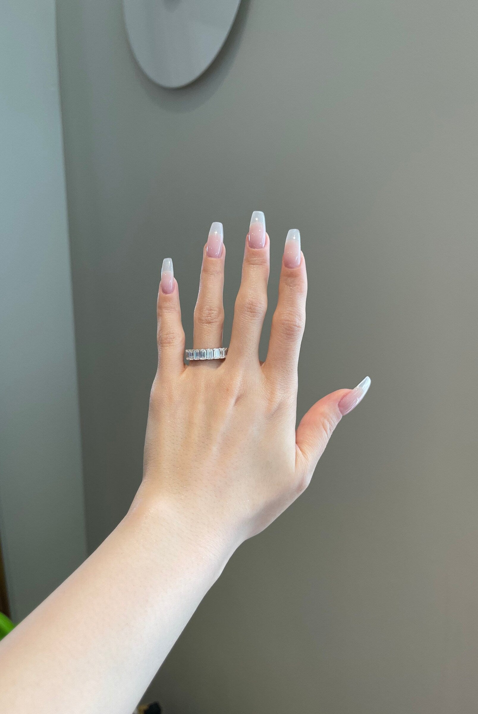 emerald-shaped-moissanite-half-eternity-wedding-band