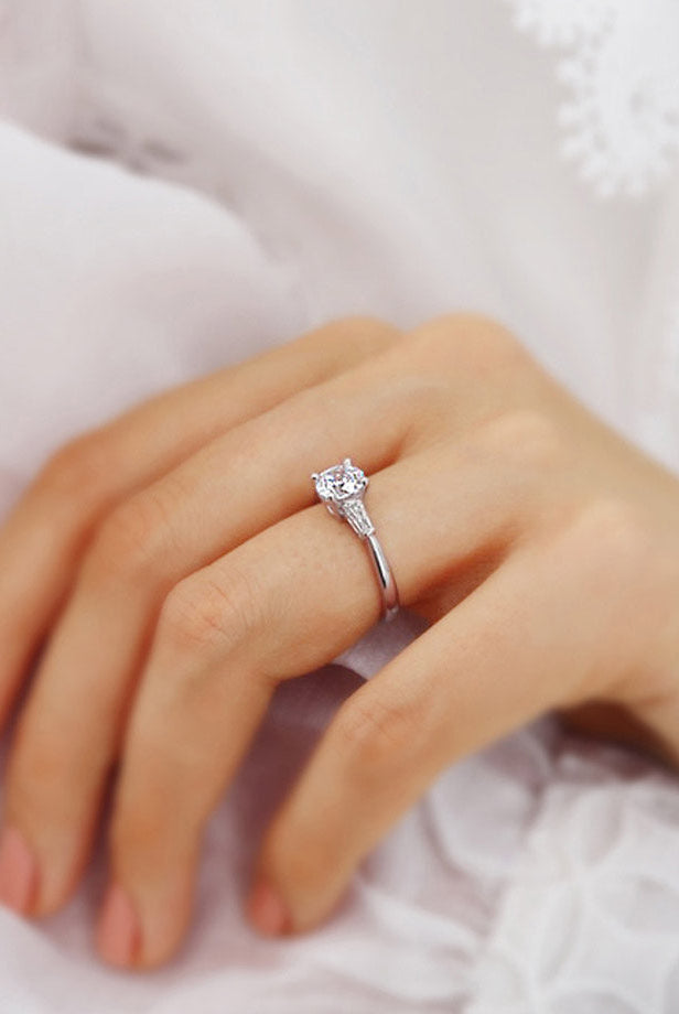 round-shaped-moissanite-three-stone-style-engagement-ring-2