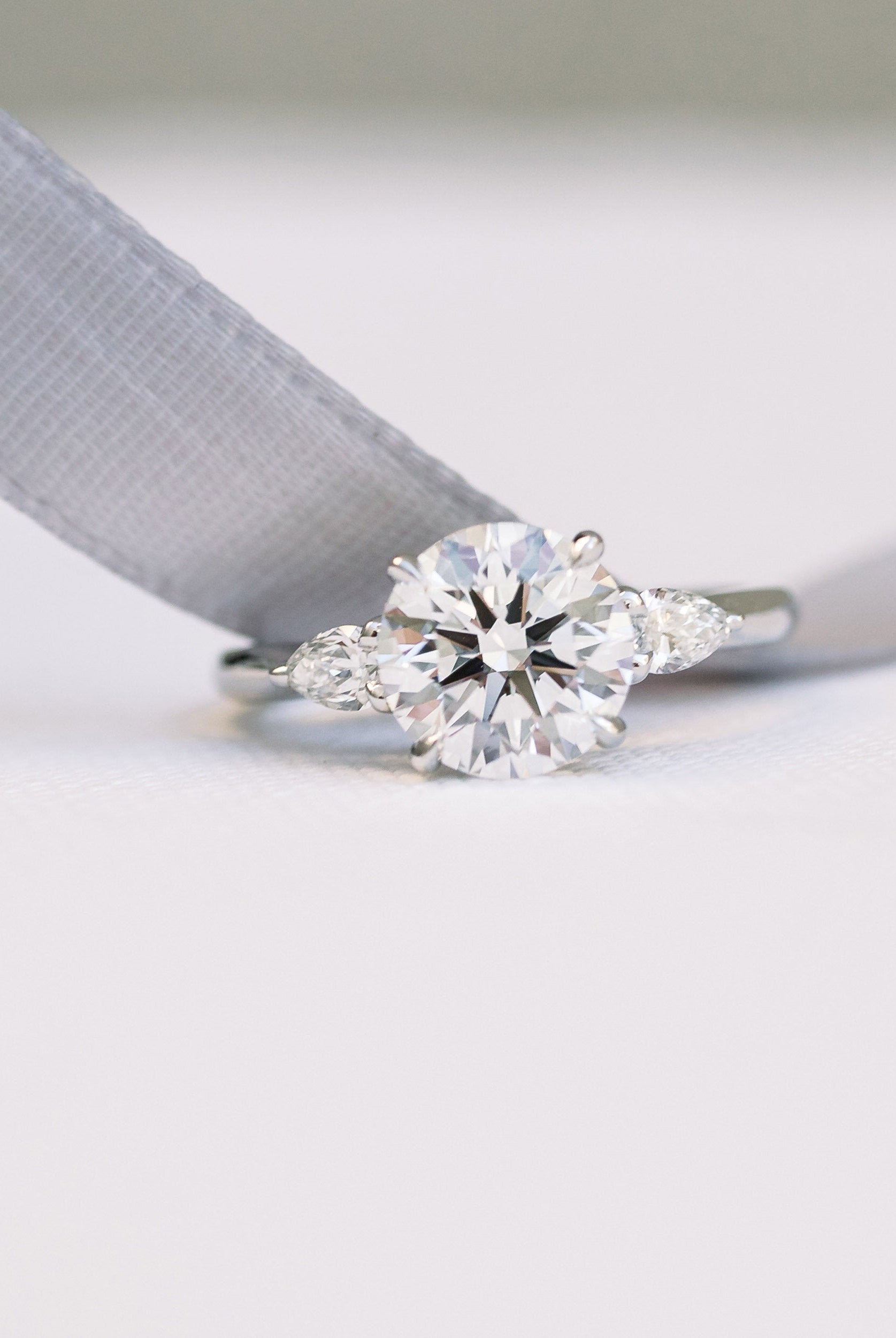 Round and Pear Moissanite Ring