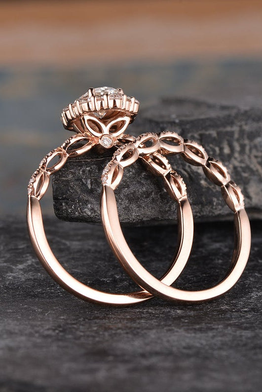 oval-cut-halo-moissanite-bridal-ring-set-1