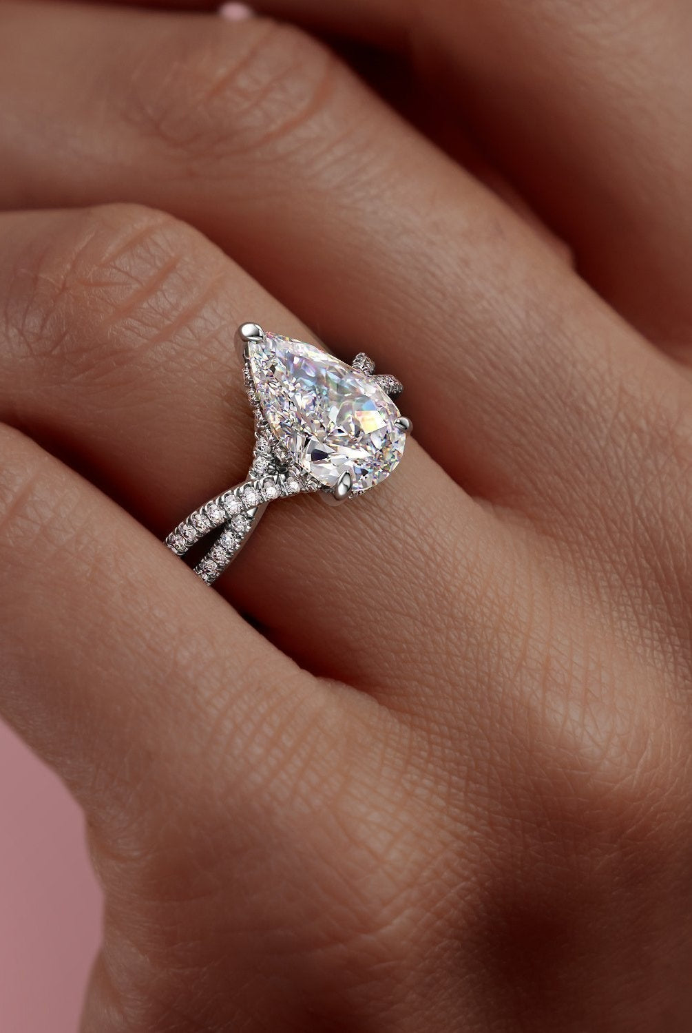 2-0-ct-pear-cut-solitaire-criss-cross-setting-moissanite-engagement-ring